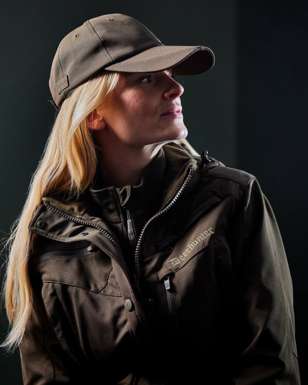 Art Green coloured Deerhunter Muflon Pro Cap on wall background 