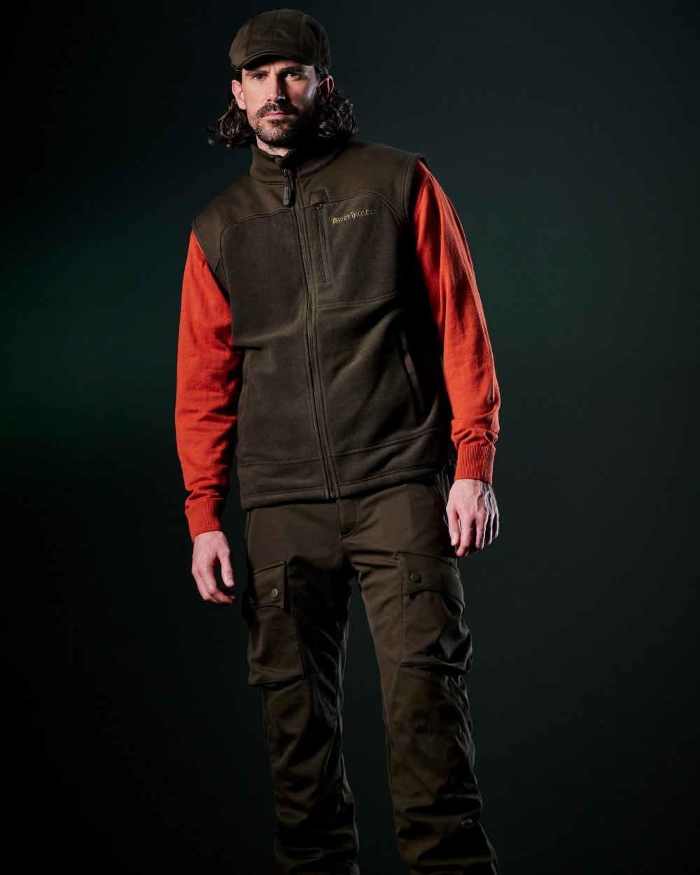 Art Green coloured Deerhunter Muflon Pro Flatcap on dark background 