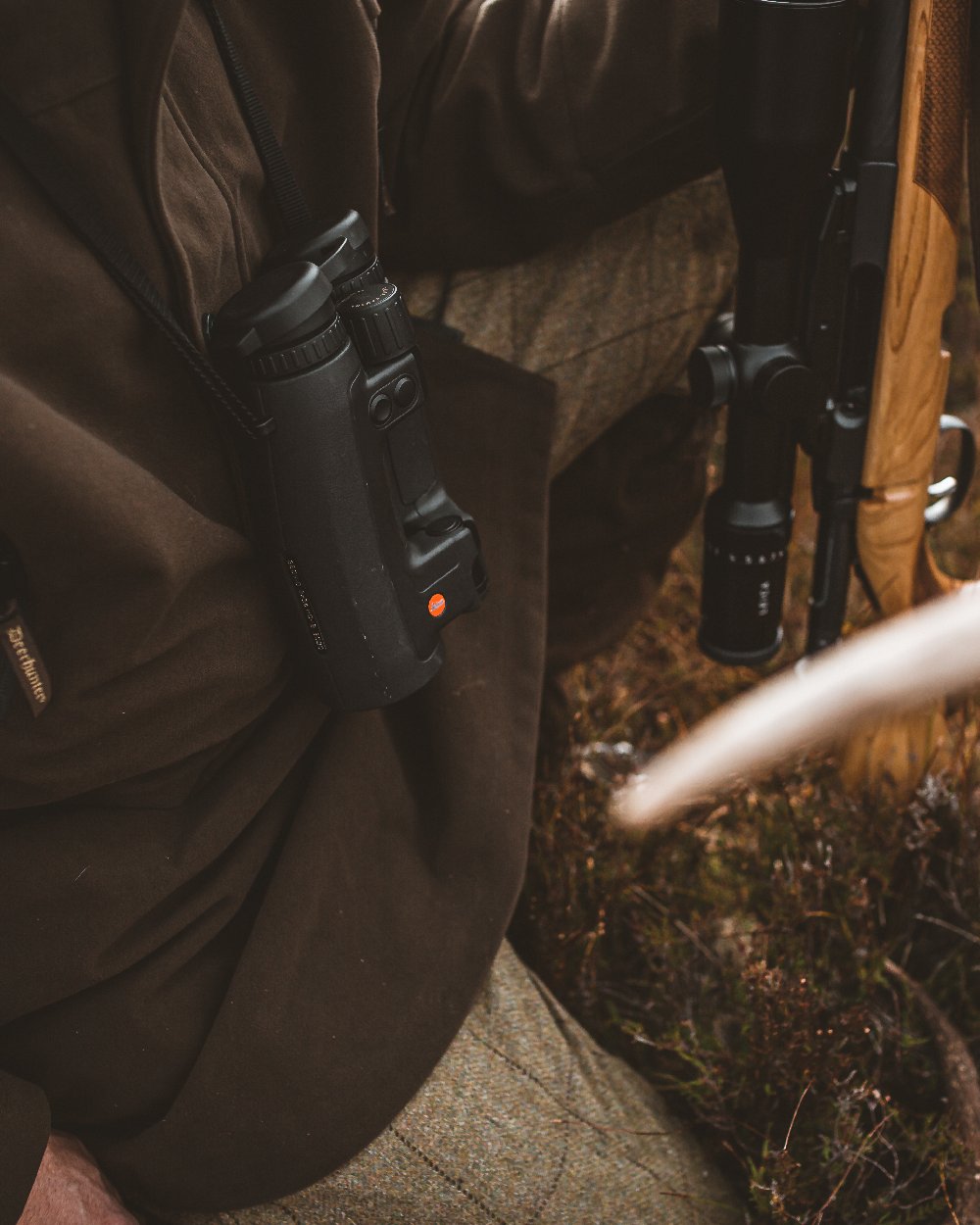 Peat Coloured Deerhunter PRO Gamekeeper Jacket on land background 