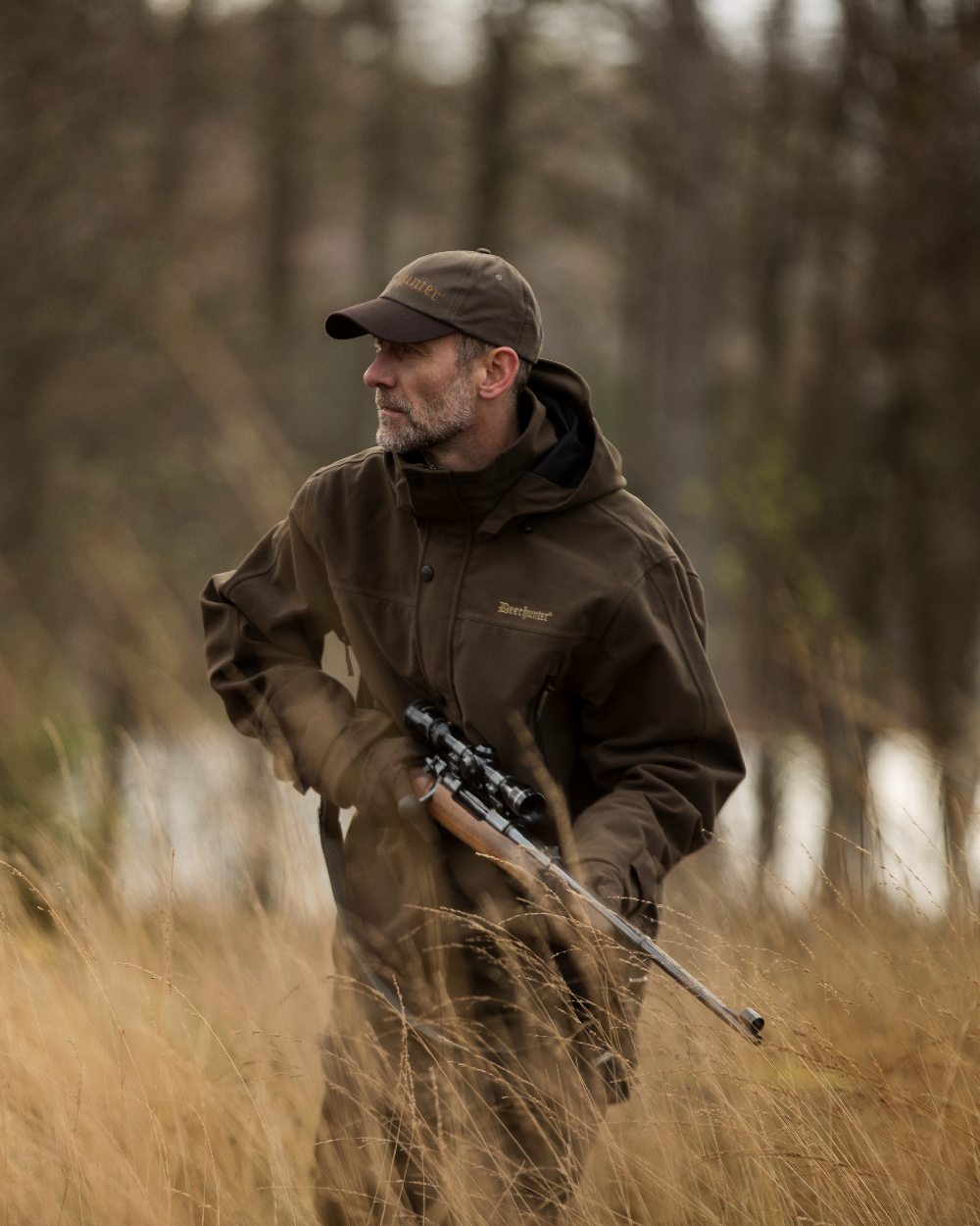 Peat Coloured Deerhunter PRO Gamekeeper Smock on forest background 