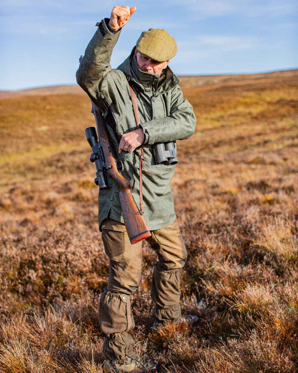 Turf Coloured Deerhunter PRO Gamekeeper Smock on land background 