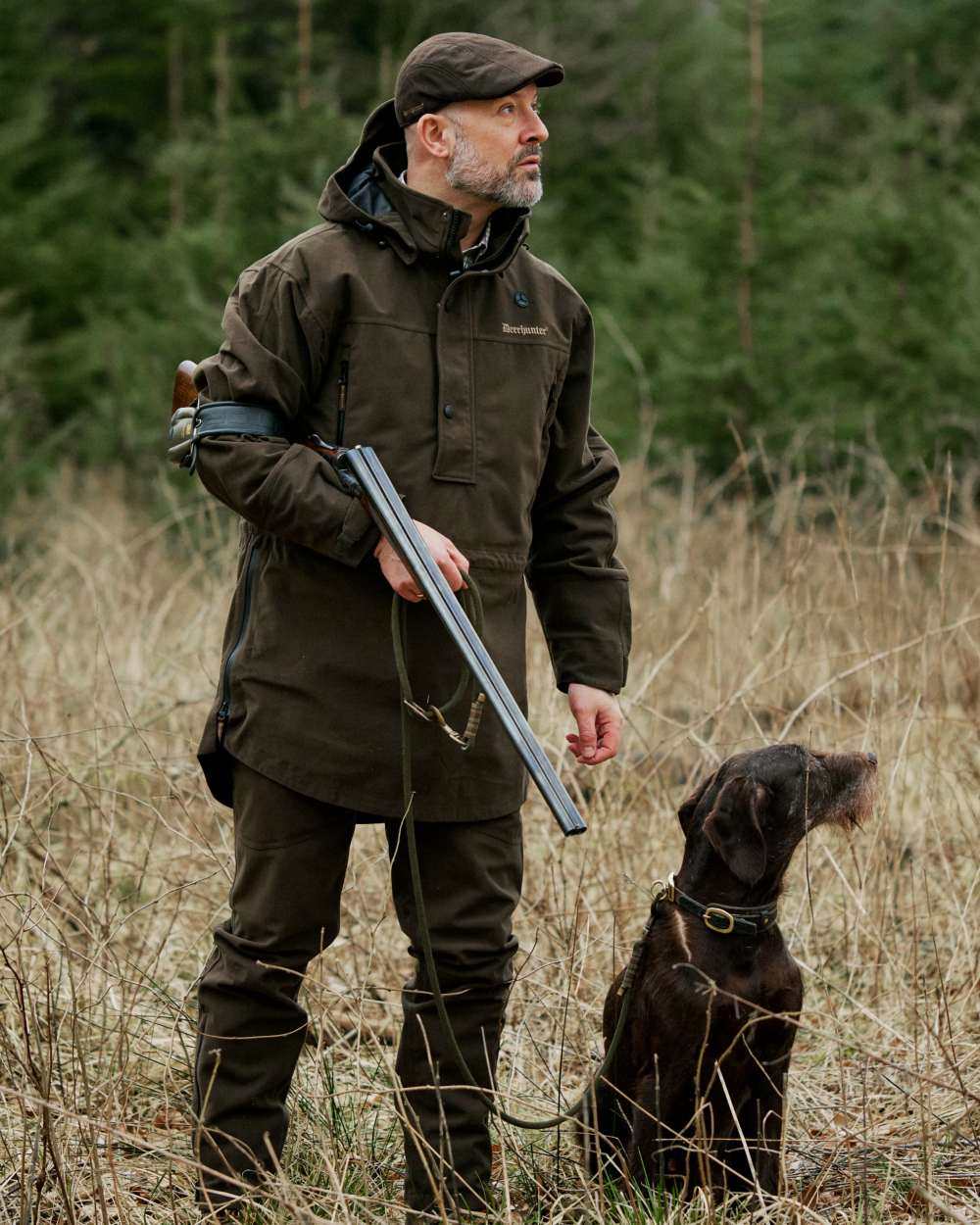 Peat Coloured Deerhunter Pro Gamekeeper Boot Trousers on forest background 