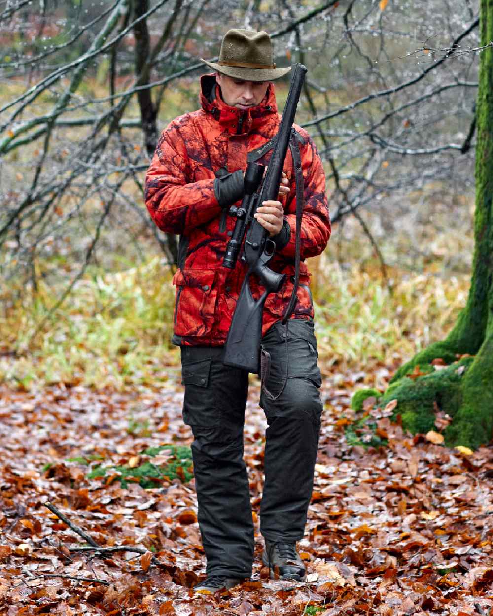 Elmwood coloured Deerhunter Ram Winter Trousers on forest background 