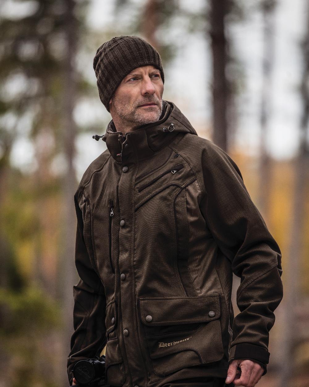 Beluga coloured Deerhunter Recon Knitted Beanie on forest background 