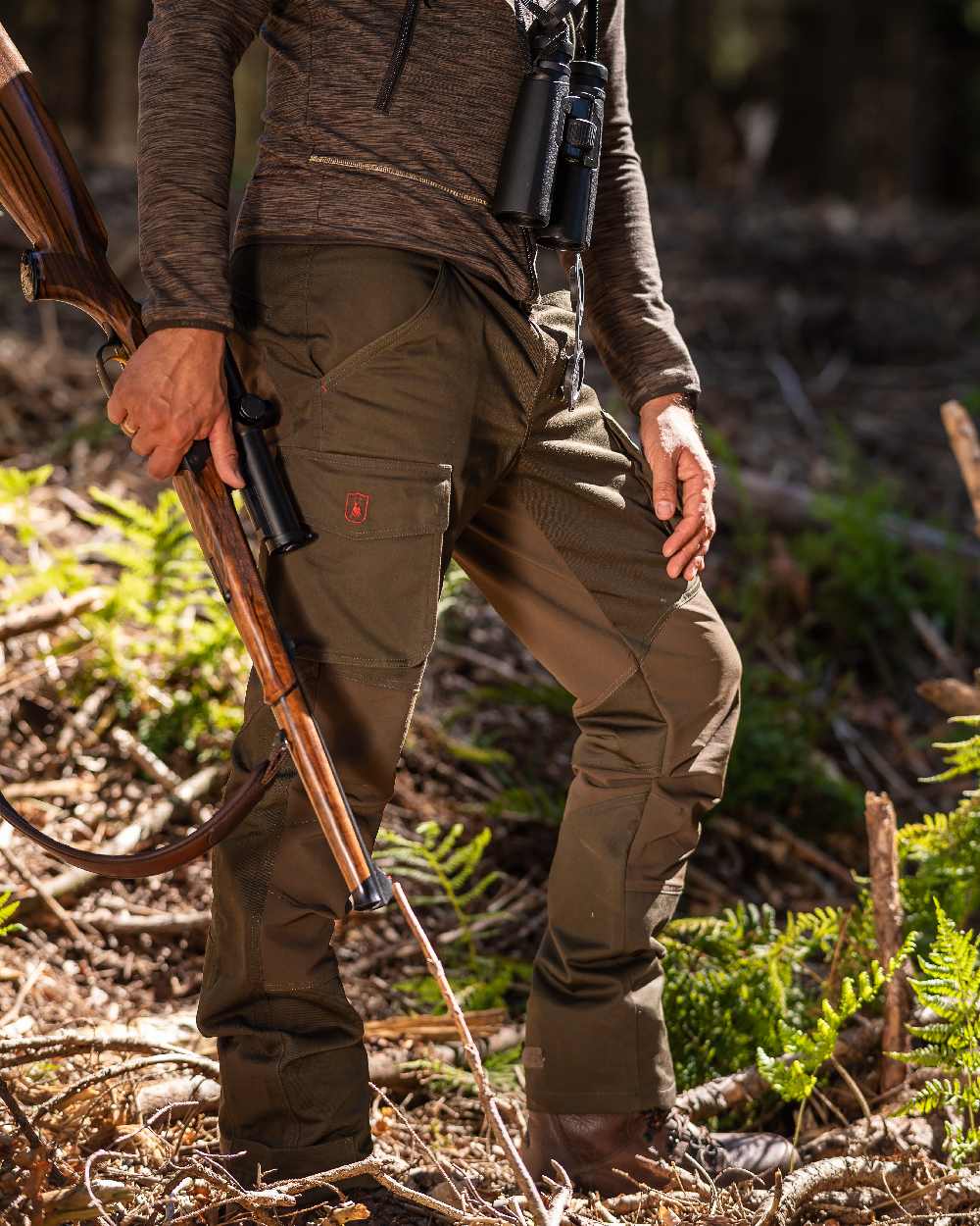 Adventure Green Coloured Deerhunter Rogaland Stretch Trousers on forest background 