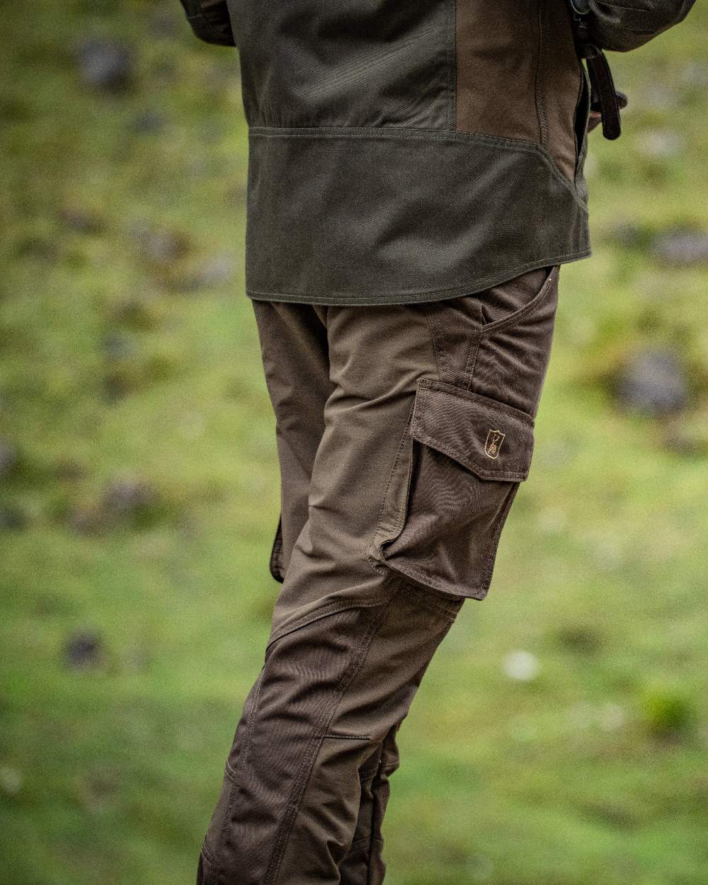 Fallen Leaf Coloured Deerhunter Rogaland Stretch Trousers on blurry background 