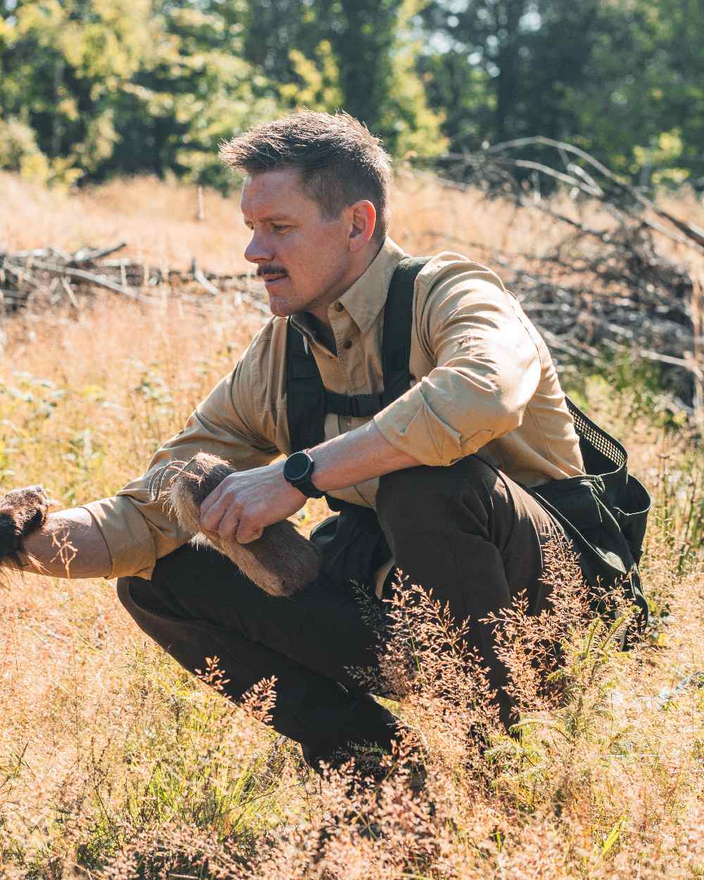 Fallen Leaf coloured Deerhunter Sarek Full Stretch Trousers on forest background 