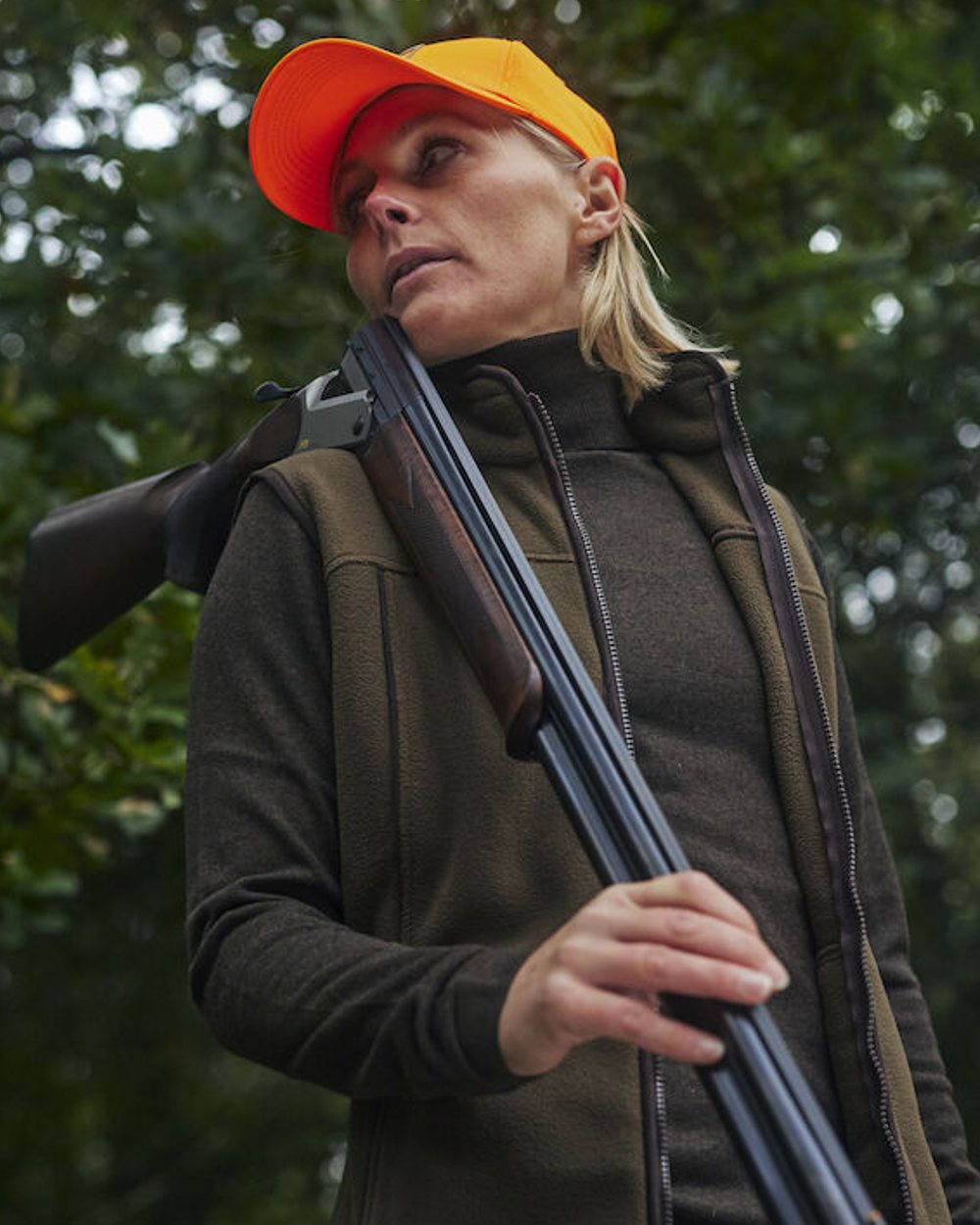 Orange coloured Deerhunter Shield Cap on Forest background 