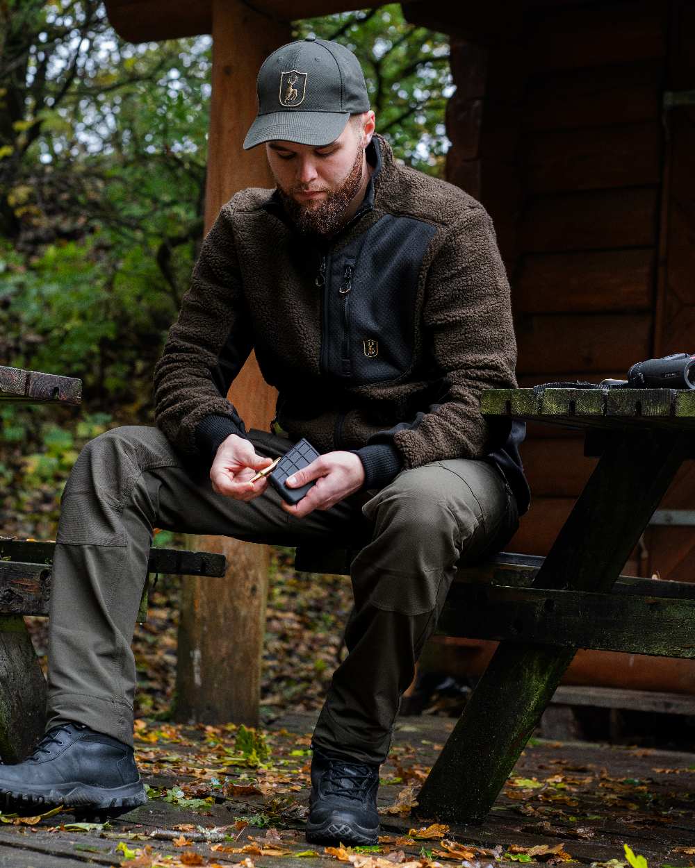 Timber coloured Deerhunter Shield Cap on forest background 