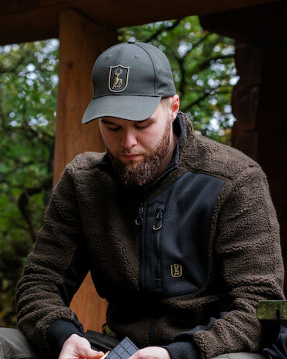 Timber coloured Deerhunter Shield Cap on Forest background 