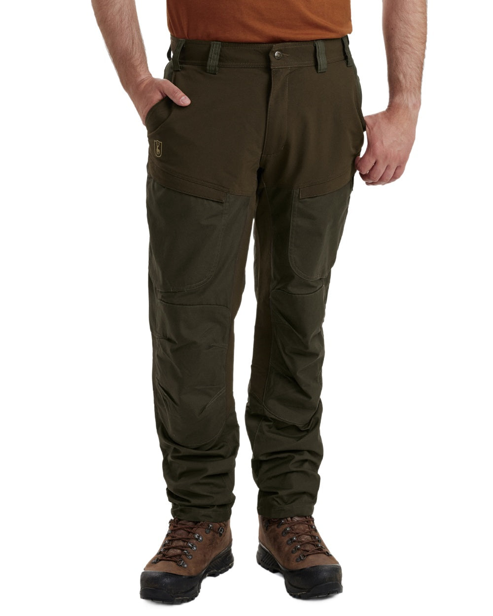 Deep Green coloured Deerhunter Strike Trousers With Membrane on forest background 