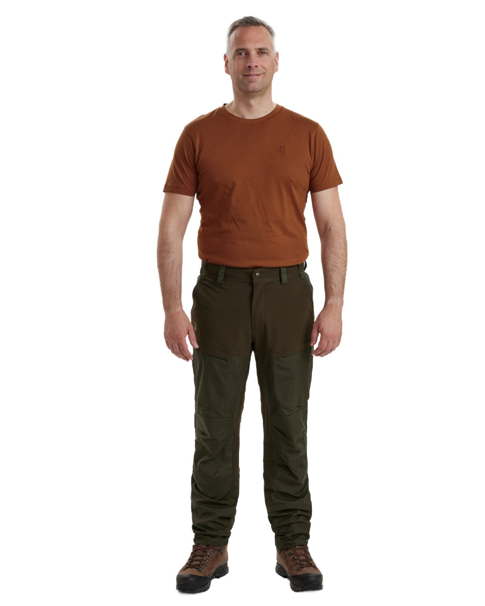 Deep Green coloured Deerhunter Strike Trousers With Membrane on forest background 