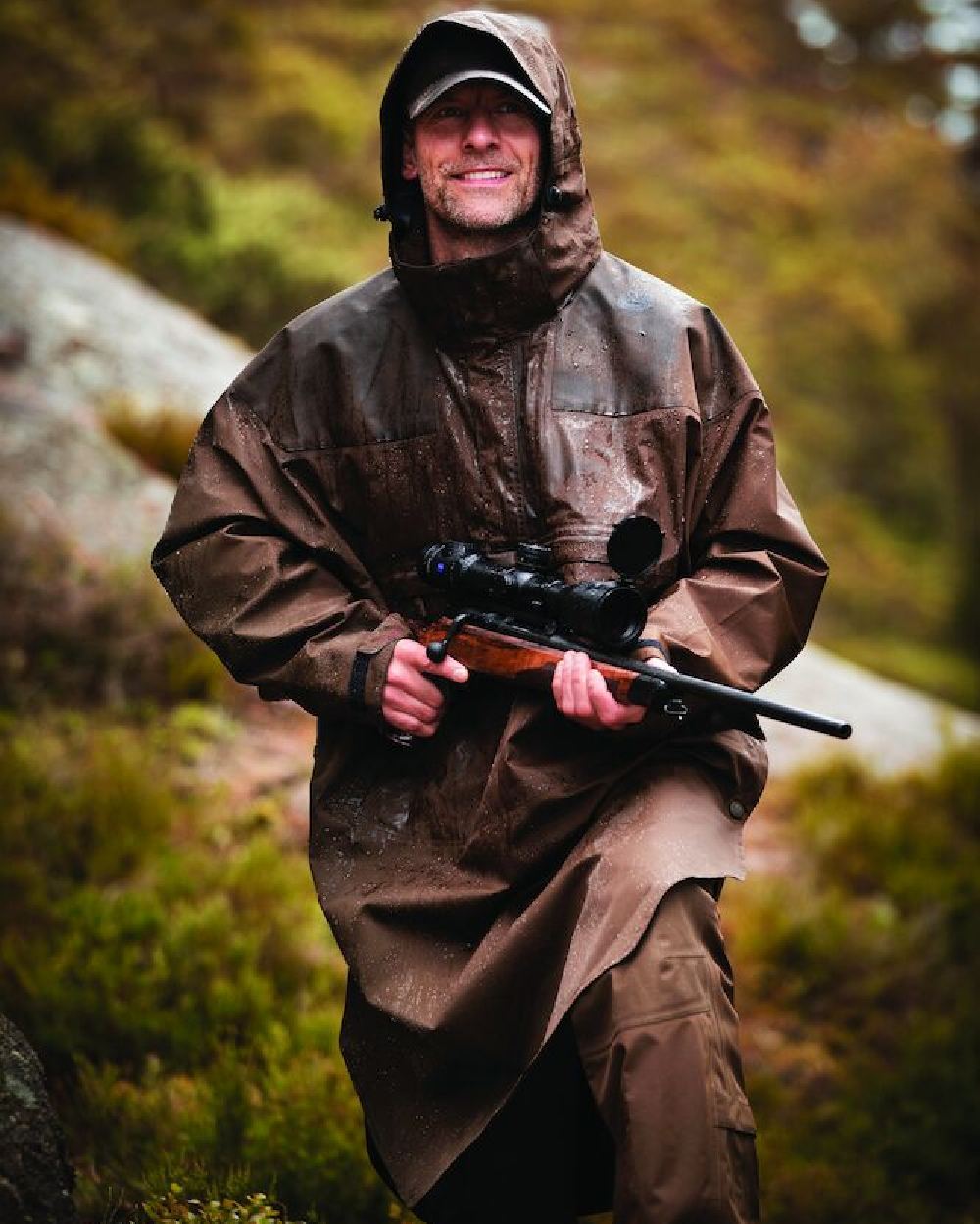 Canteen Coloured Deerhunter Track Rain Long Anorak on mountain background 