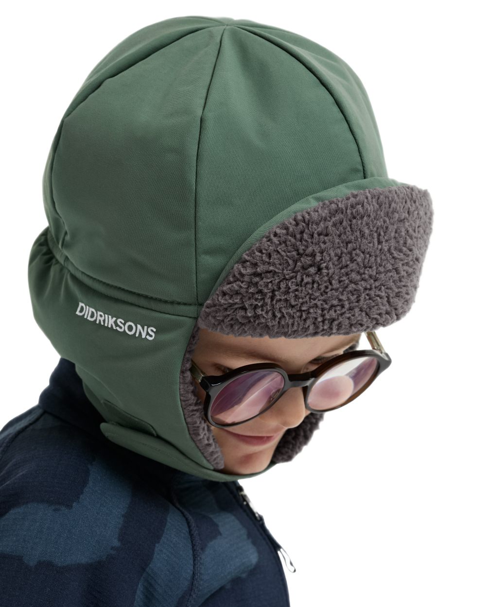 Dark Moss coloured Didriksons Biggles Cap 7 on white background 