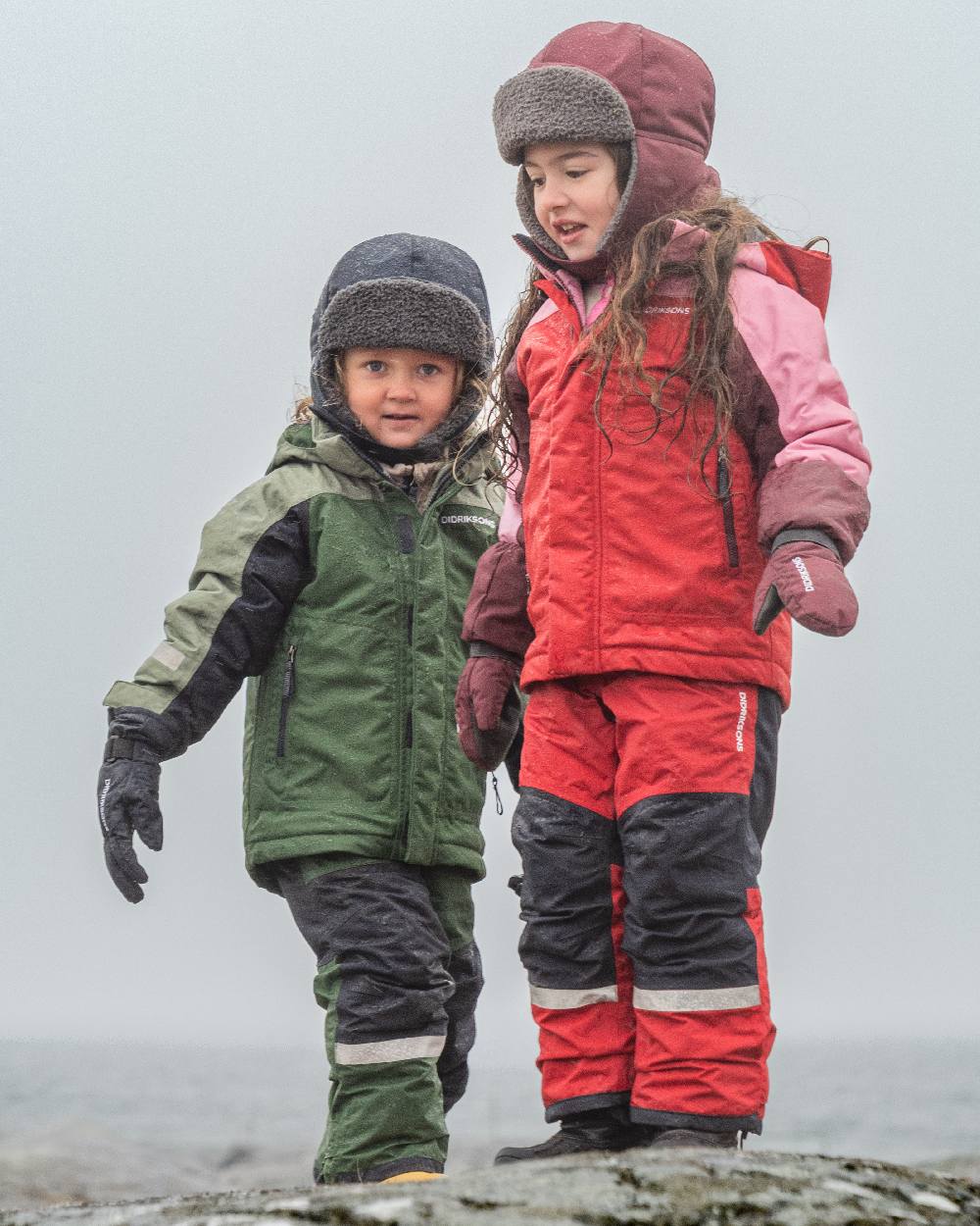 Anemon Red Coloured Didriksons Biggles Kids Cap on outdoor background 