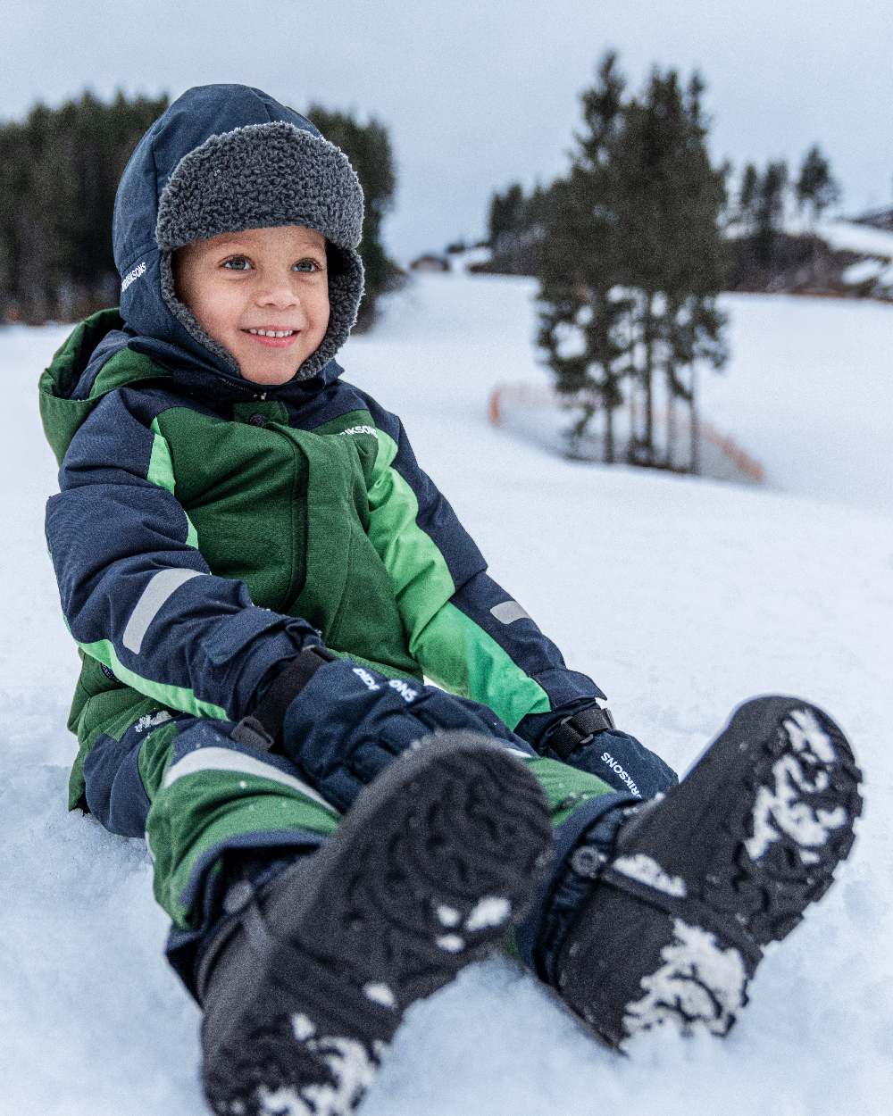 Navy Coloured Didriksons Biggles Kids Cap on outdoor background 