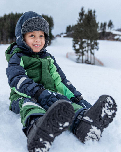 Navy Coloured Didriksons Biggles Kids Cap on outdoor background 