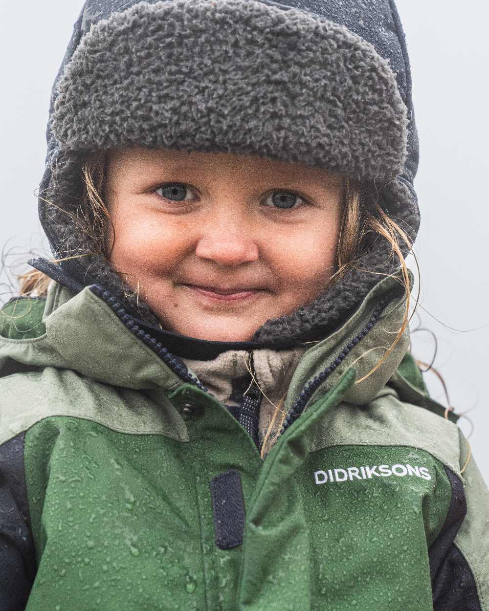 Navy Coloured Didriksons Biggles Kids Cap on outdoor background 