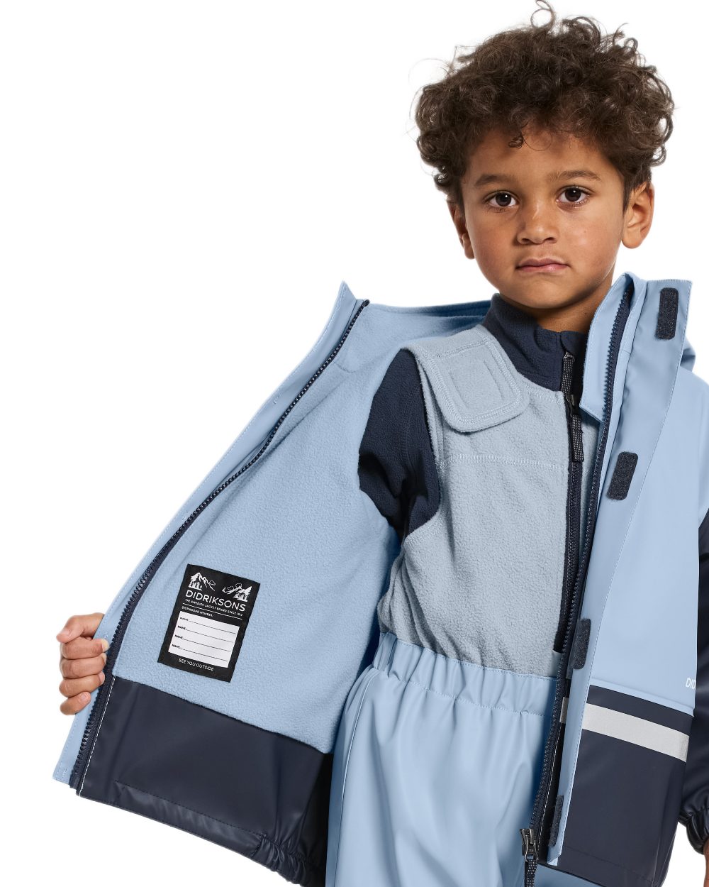 Cloud Blue coloured Didriksons Boardman Kids Rain Set on white background 