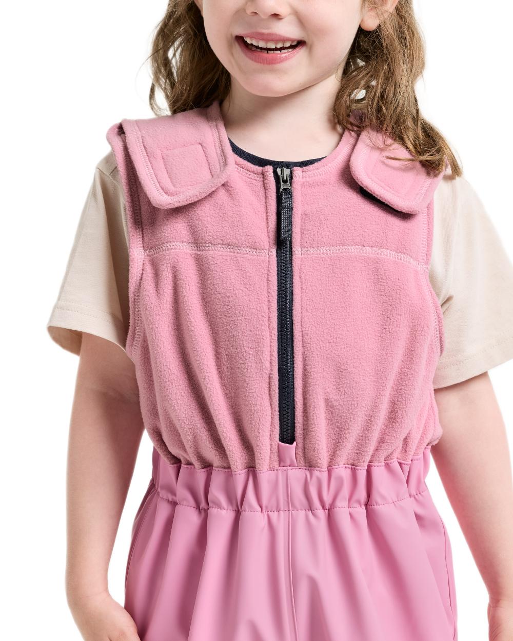 Light Heather Pink coloured Didriksons Boardman Kids Rain Set on white background 