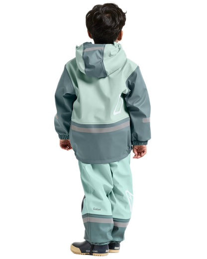 Ocean Mint coloured Didriksons Boardman Kids Rain Set on white background 