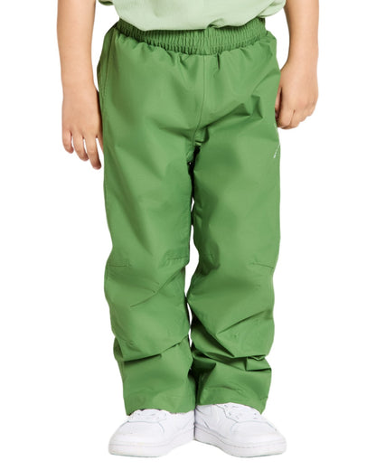 Algae Green coloured Didriksons Childrens Avan Pants on white background 