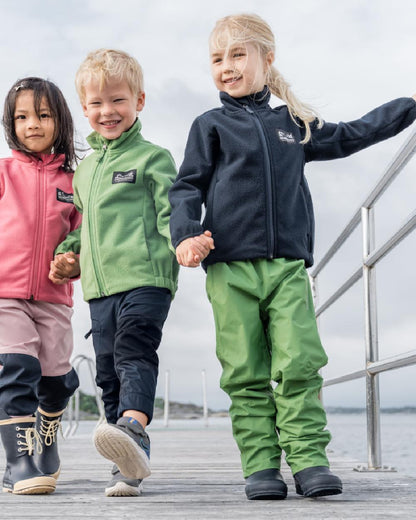 Algae Green coloured Didriksons Childrens Avan Pants on sea background 