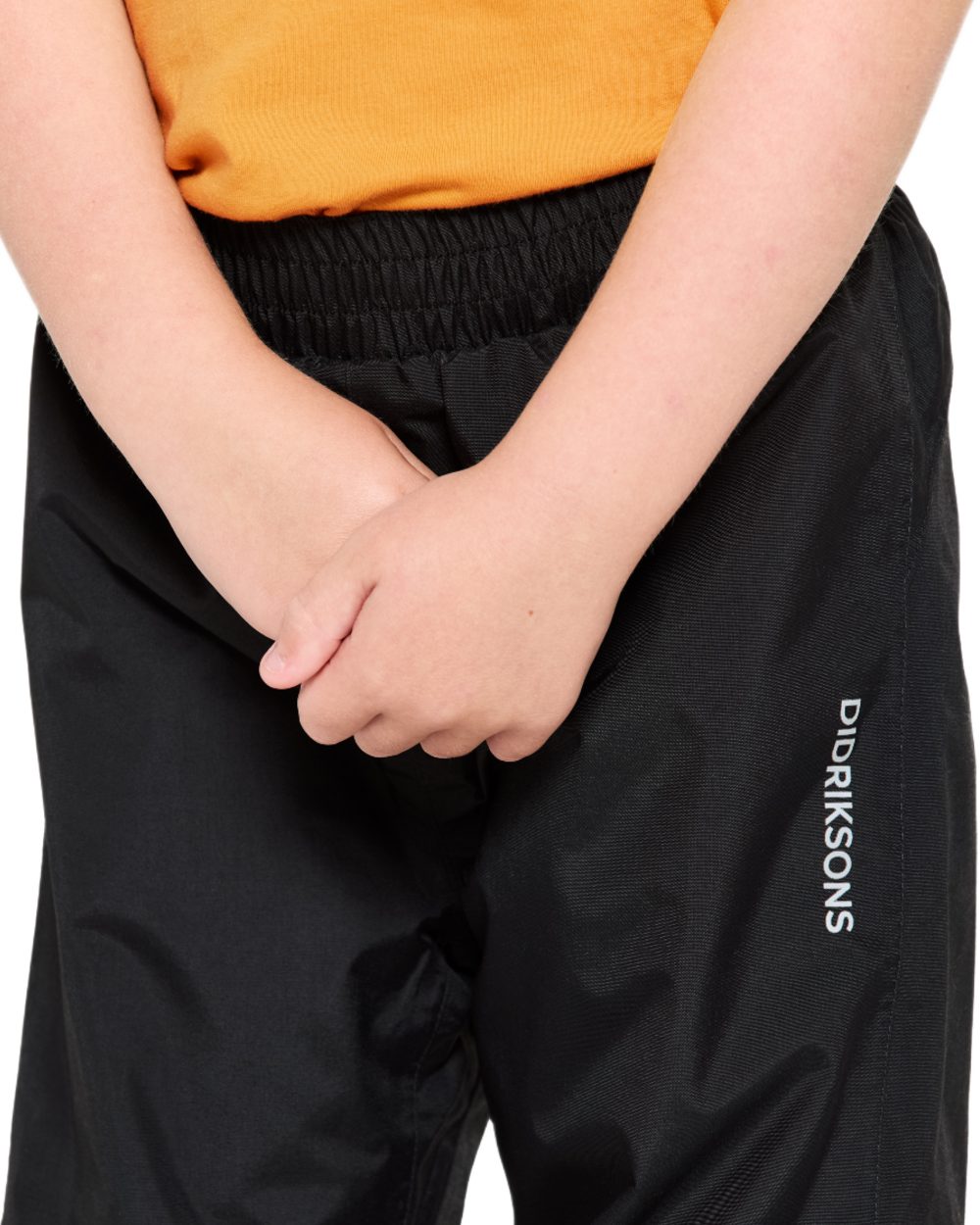 Black coloured Didriksons Childrens Avan Pants on white background 