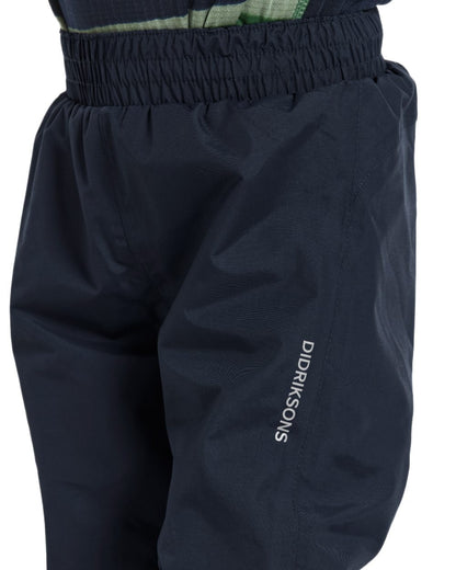 Navy coloured Didriksons Childrens Avan Pants 2 on white background 