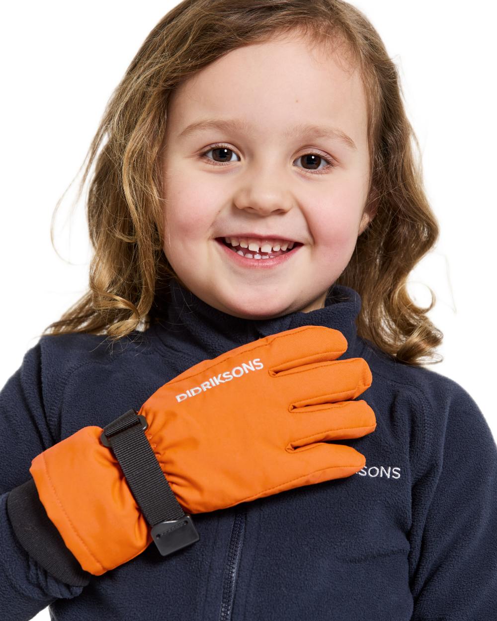 Orange Jam coloured Didriksons Childrens Biggles Gloves on white background 