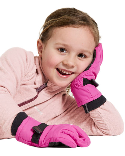 Plastic Pink coloured Didriksons Childrens Biggles Gloves on white background 