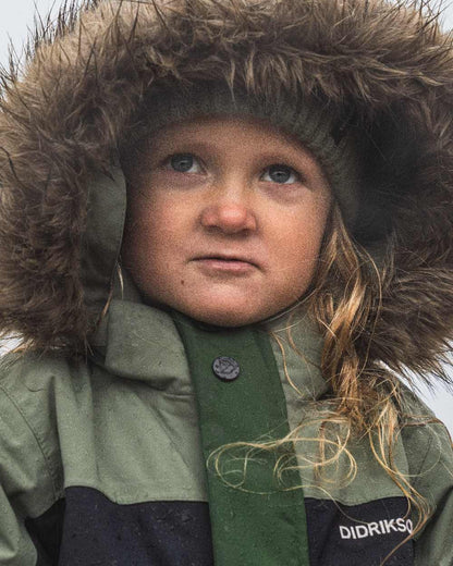 Light Moss Coloured Didriksons Childrens Bjärven Coveralls on outdoor background 