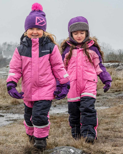 Sweet Pink Coloured Didriksons Childrens Bjärven Coveralls on outdoor background 
