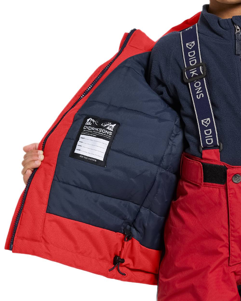 Pomme Red Coloured Didriksons Childrens Bjärven Parka on white background 