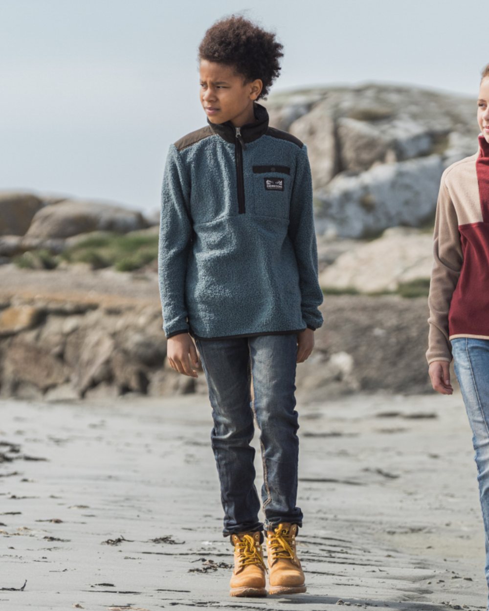 Star Blue coloured Didriksons Childrens Exa Full-Zip Fleece 3 on sea background 