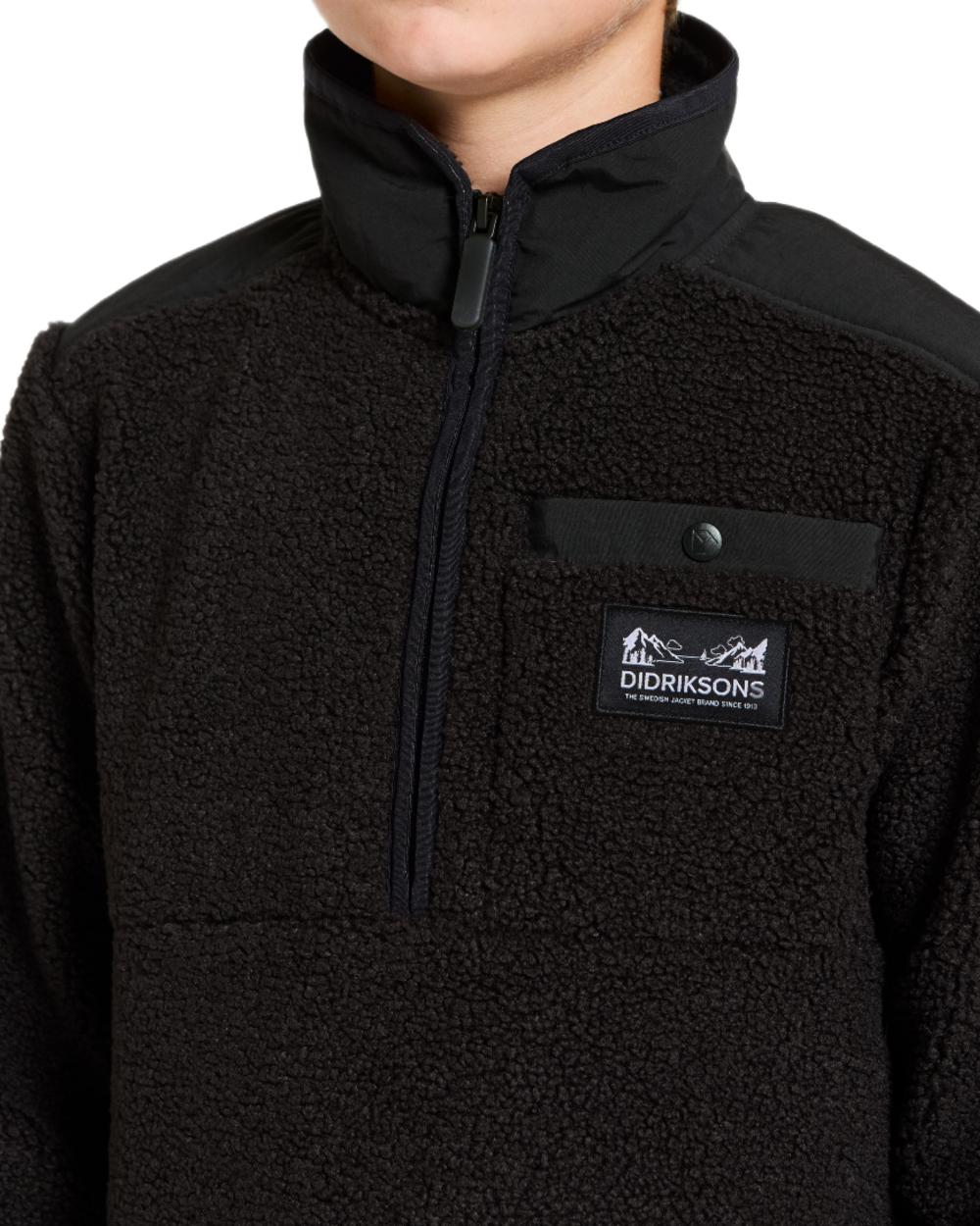 Black coloured Didriksons Childrens Exa Half Zip Sweater on white background 