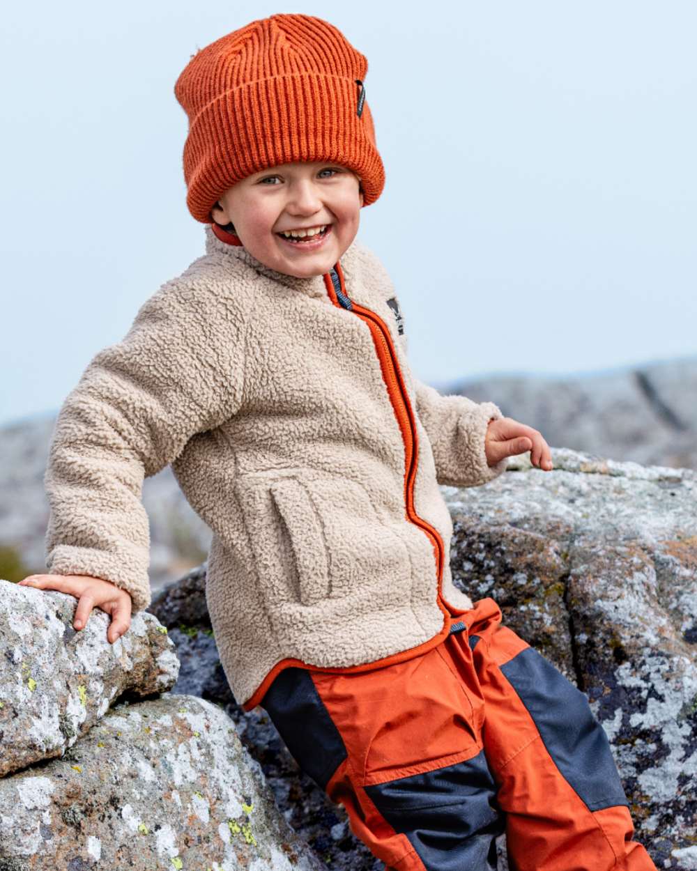 Beach Beige Rust coloured Didriksons Childrens Gibbs Full Zip Jacket 2 on beach background 