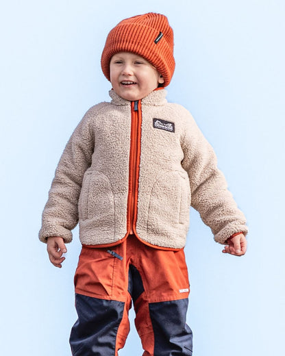 Beach Beige Rust coloured Didriksons Childrens Gibbs Full Zip Jacket 2 on beach background 