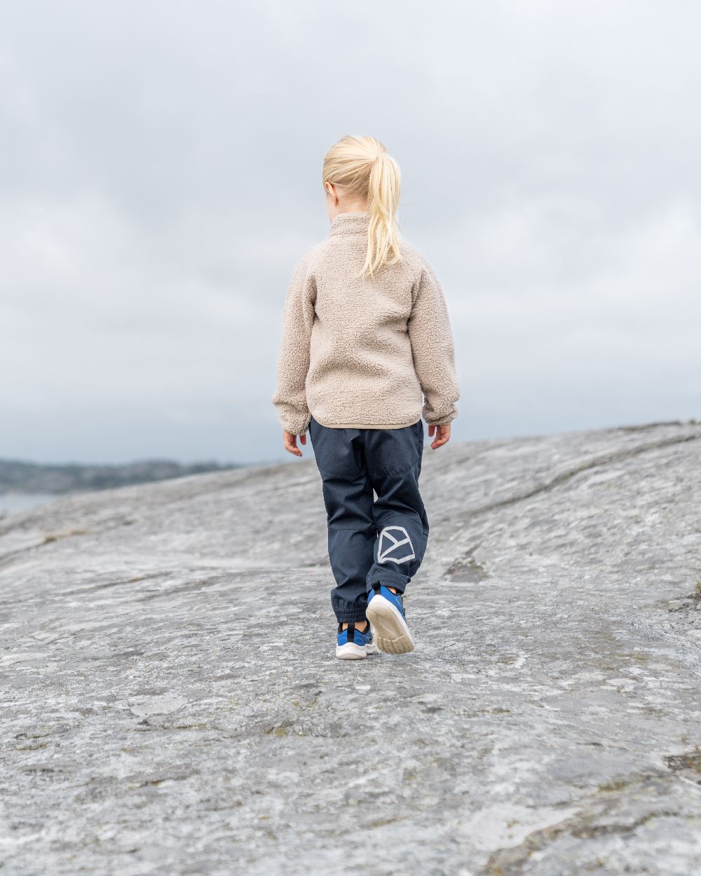Beach Beige coloured Didriksons Childrens Gibbs Full Zip Jacket 2 on sky background 