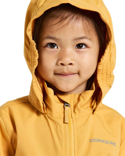 Dark Pollen coloured Didriksons Childrens Hallon Jacket on white background 