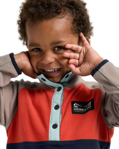 Paprika coloured Didriksons Childrens Monte Half Button Fleece 5 on white background 