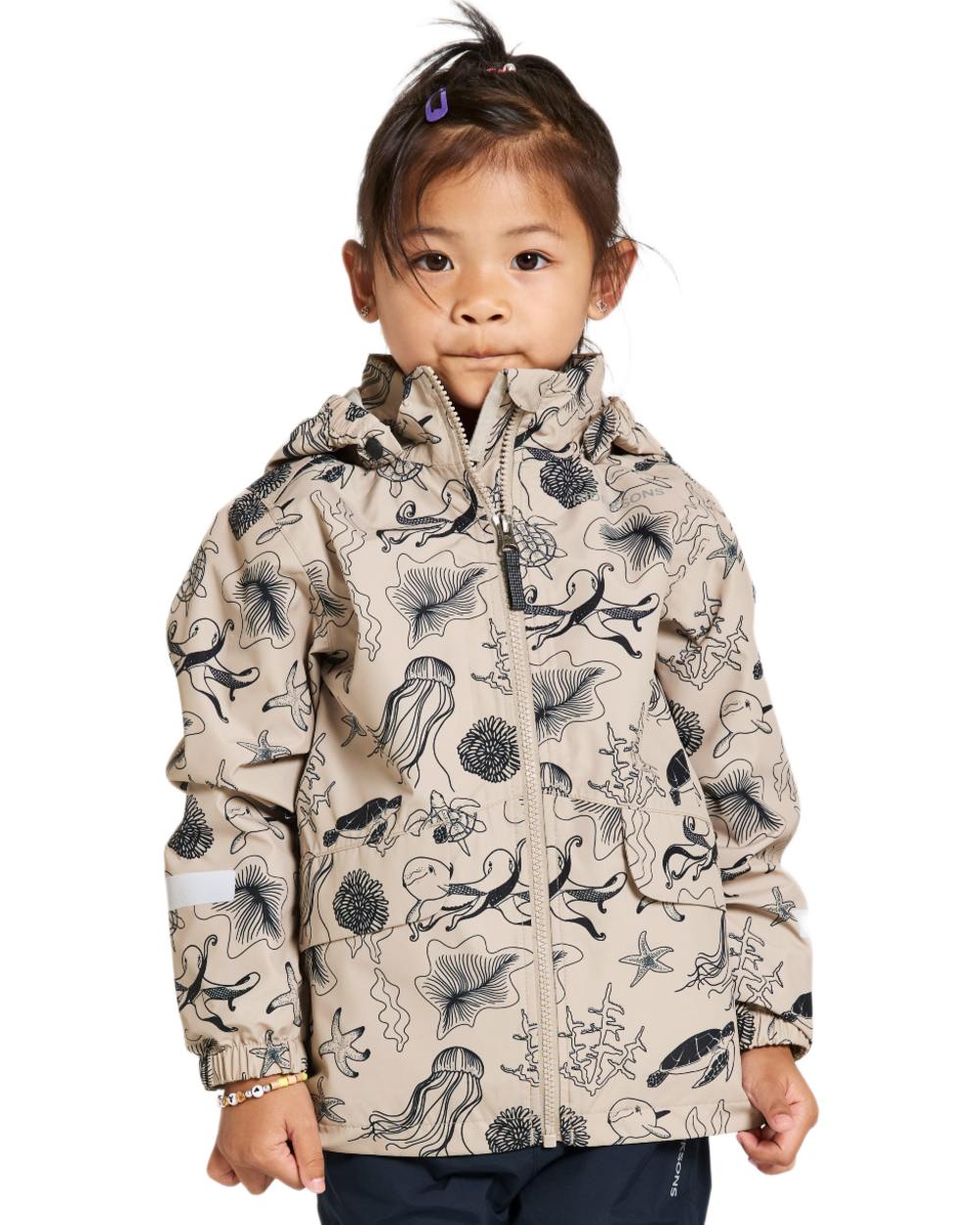 Ocean Beach Beige coloured Didriksons Childrens Norma Printed Jacket on white background 
