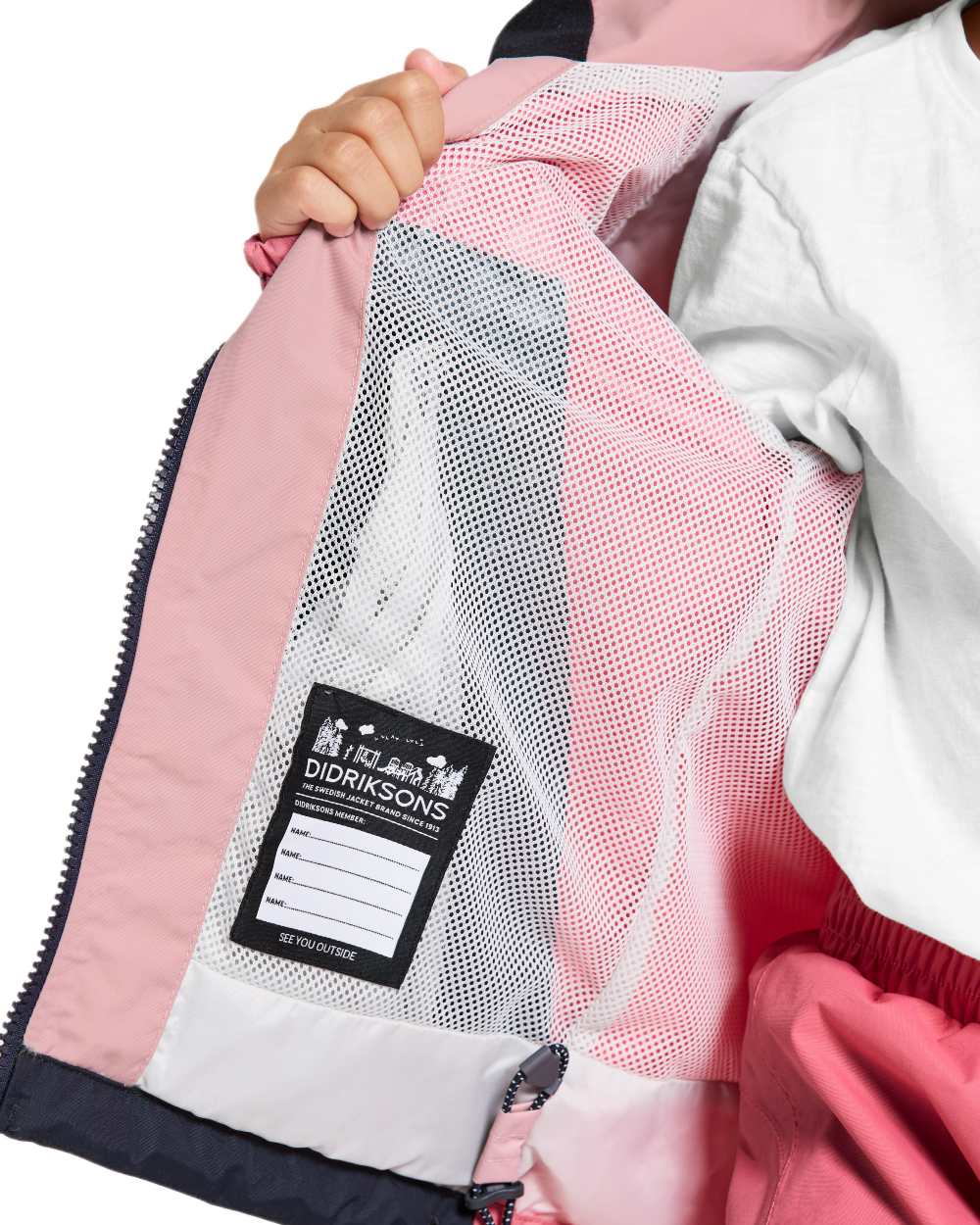 Soft Pink coloured Didriksons Childrens Pilvi Jacket on white background 