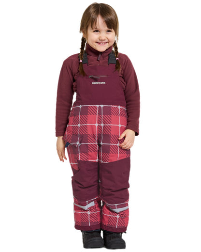 Termos Rusty Wine Coloured Didriksons Kids Polarbjörn Printed Bib Pants on white background 