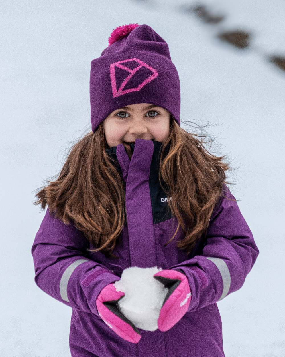Royal Purple Coloured Didriksons Kids Skare Set on snow background 