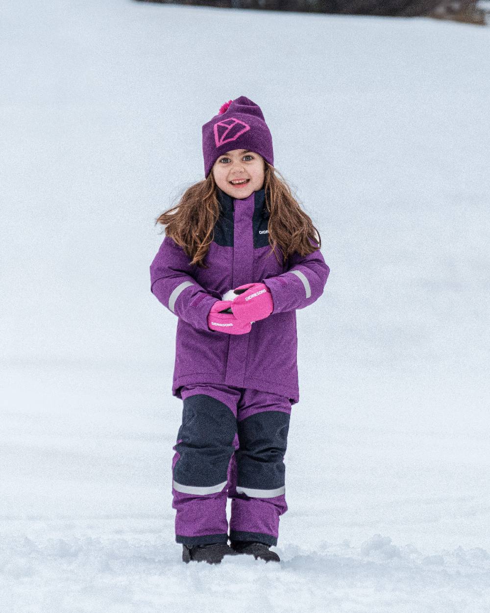 Royal Purple Coloured Didriksons Kids Skare Set on snow background 