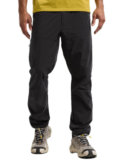 Black coloured Didriksons Mens Asher Pants on white background 