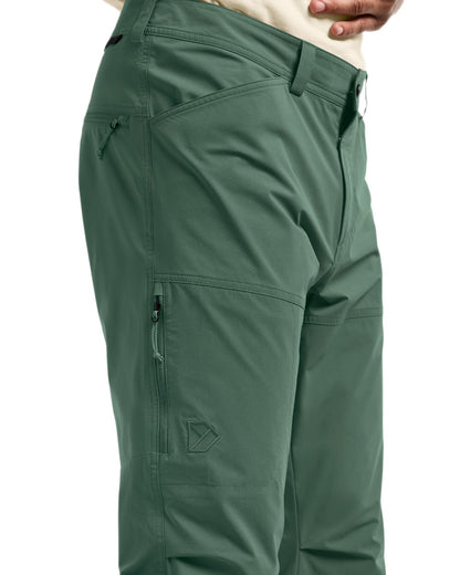 Dark Moss coloured Didriksons Mens Asher Pants on white background 