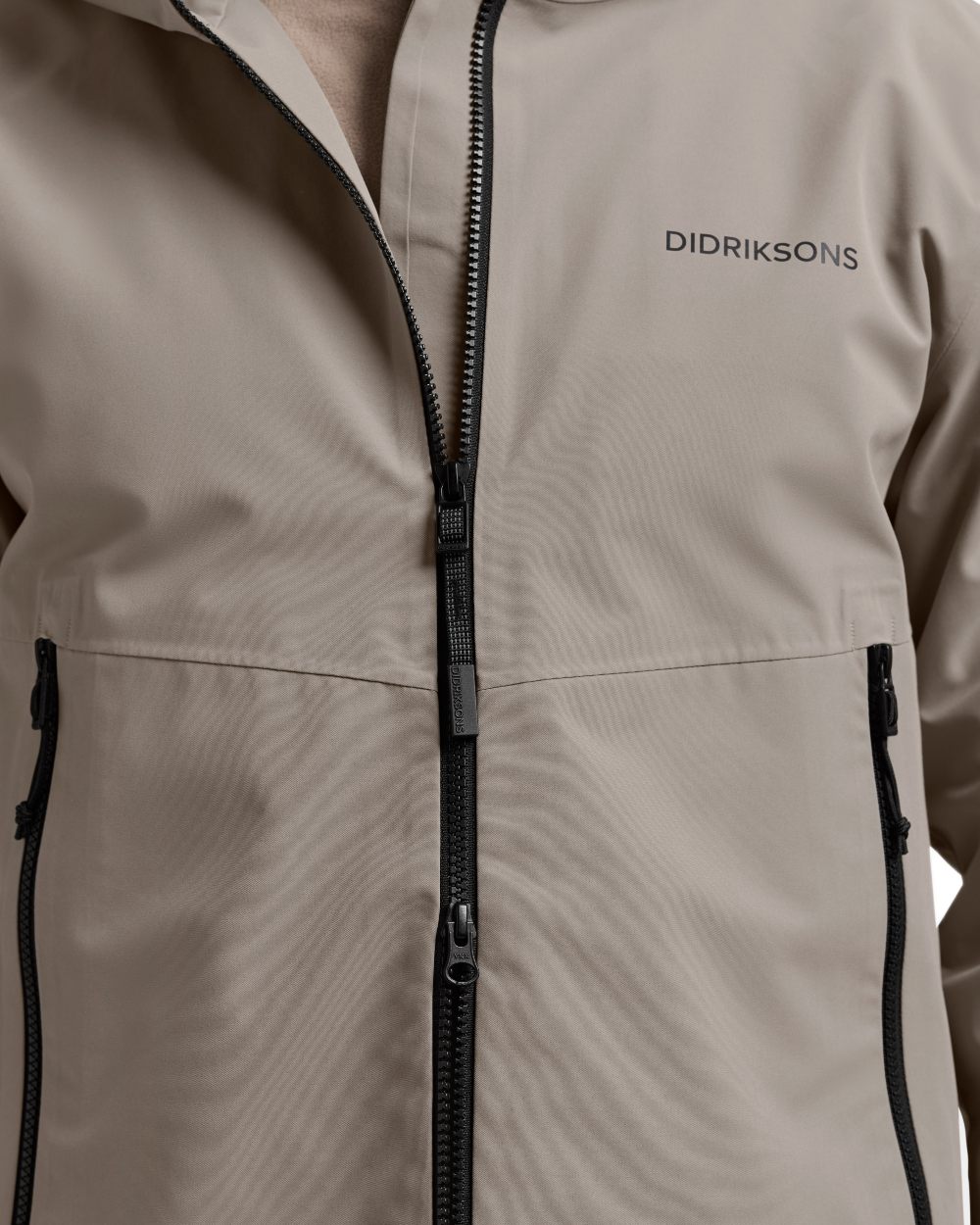 Ash Brown coloured Didriksons Mens Biak Jacket on white background 
