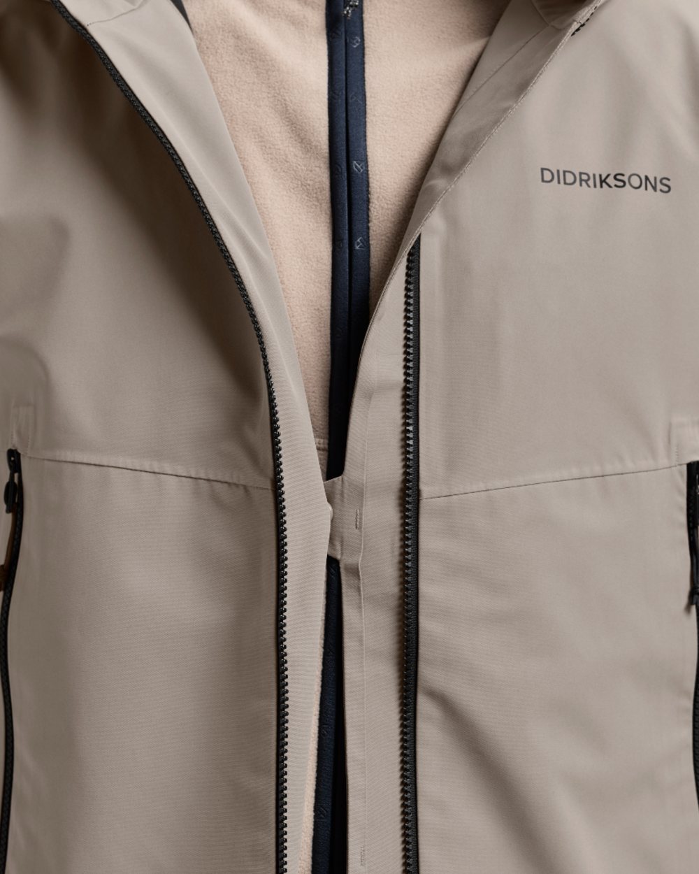 Ash Brown coloured Didriksons Mens Biak Jacket on white background 